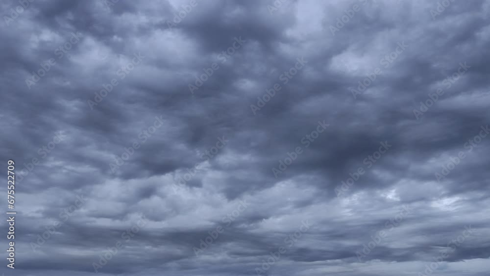 Dark clouds of curious shapes move Dark clouds of curious shapes move
