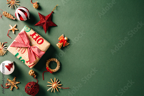 Vintage Christmas gift box on green backdrop - Festive holiday decorations in a cozy setting