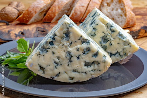 Cheese collection, piece of French blue cheese auvergne or fourme d'ambert photo