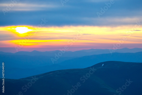 brightly colorful clouds in the evening sky. Lush colored clouds in the sky before sunset. dawn in the clouds