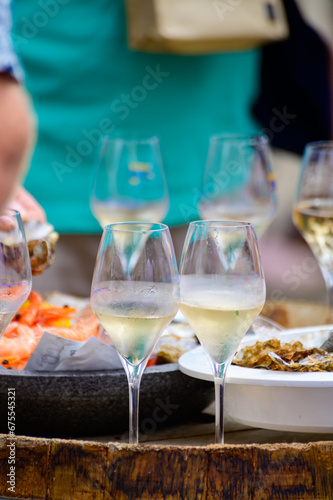 Tasting of sparkling white wine with bubbles champagne on summer festival route of champagne in Cote des Bar  Champagne region  France