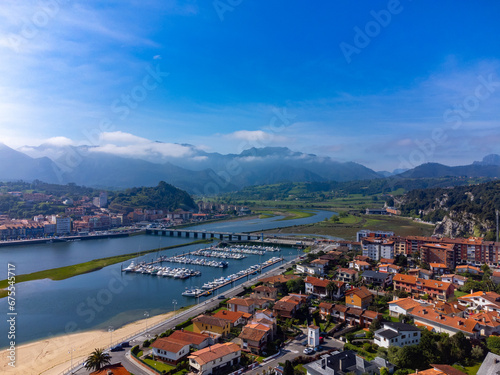 Aerial panoramic view, vacation on Costa Verde, Green coast of Asturias, Ribadesella village with sandy beaches, North of Spain