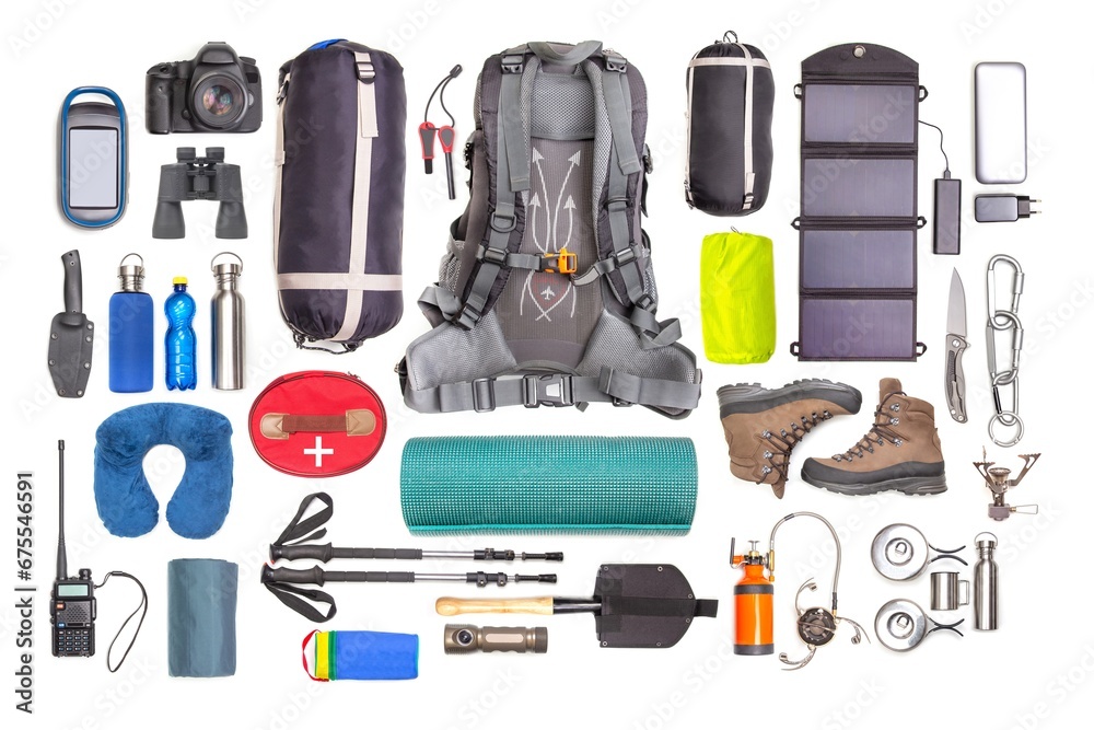 Set of tourist trekking items on white background. Top view of accessories for travel. Equipment for travel and hiking. Survival Items. Set of tourist trekking items on white background. Top view of accessories for travel. Equipment for travel and hiking. Survival Items.