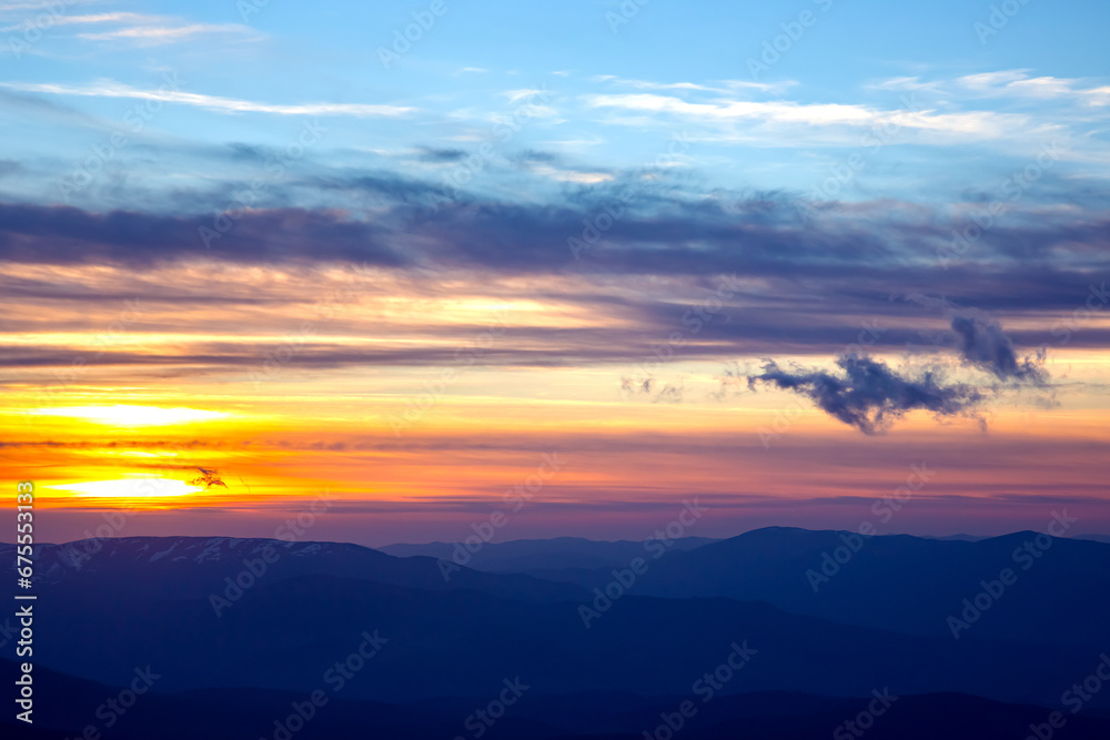 brightly colorful clouds in the evening sky. Lush colored clouds in the sky before sunset brightly colorful clouds in the evening sky. Lush colored clouds in the sky before sunset