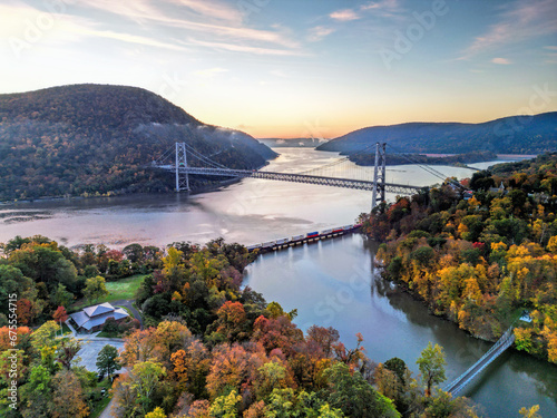 Aerial view of the Bear Mountain Bridge and Hudson River at sunrise in the fall photo