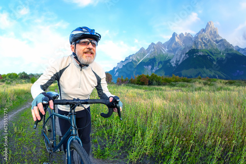 bearded man cyclist rides a bike on a road in nature. sports, hobbies and entertainment for health