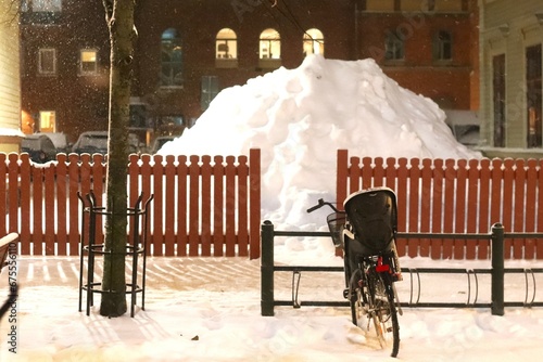 Wet and snowy streets in Umeå city. Colorful streets on a cold month of November in northern Sweden.