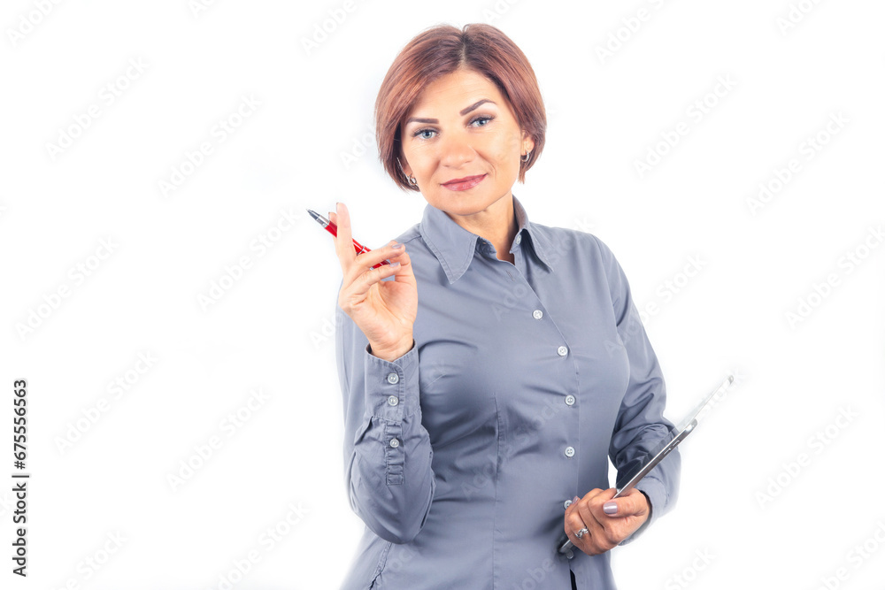 Beautiful young business woman with a red pen and notebook in hands on a white background Beautiful young business woman with a red pen and notebook in hands on a white background