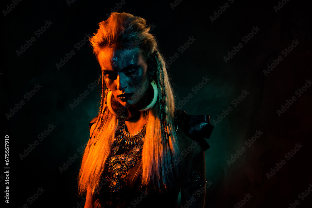 Photo of scary north mystic woman wear gothic valkyrie costume taking part viking party isolated orange color background