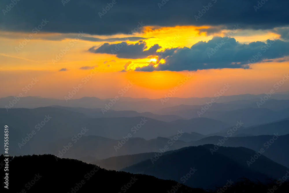 Fototapeta premium brightly colorful clouds in the evening sky. Lush colored clouds in the sky before sunset