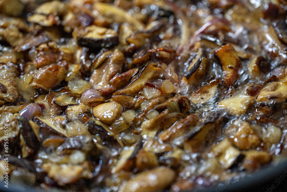 Detail of frying mushrooms and onions. Detail of frying mushrooms and onions.