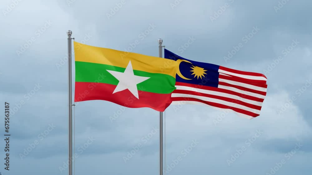 Malaysia and Myanmar flag waving together on cloudy sky, endless seamless loop, two country cooperation concept Malaysia and Myanmar flag waving together on cloudy sky, endless seamless loop, two country cooperation concept