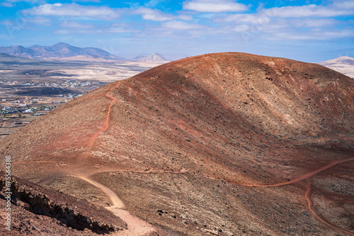 View of a large hill whose nature is a volcano. Photography taken in Fuerteventura, Canary Islands, Spain.