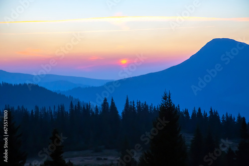 bright sunny dawn on the mountain slopes © photosaint