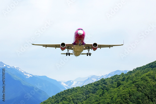 Passenger jet plane flies in the sky. Air transport industry photo