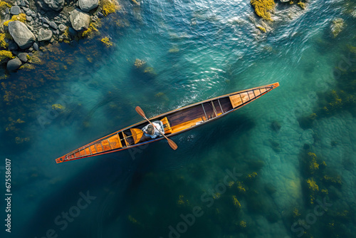 aerial view of a rowing boat in an autumn landscape