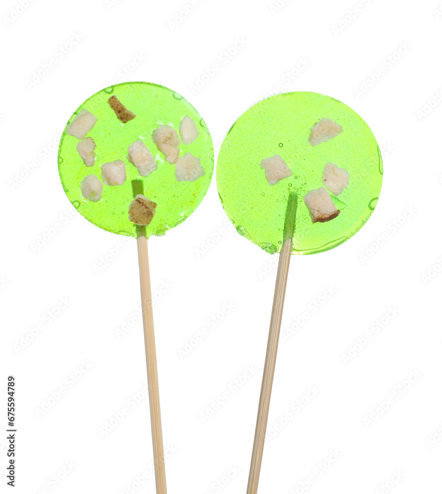 Sticks with light green lollipops isolated on white Sticks with light green lollipops isolated on white