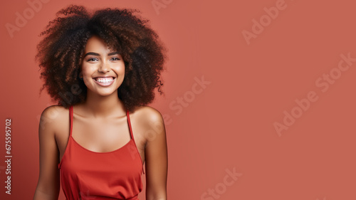 Afro-american woman model wearing a red sundress isolated on pastel