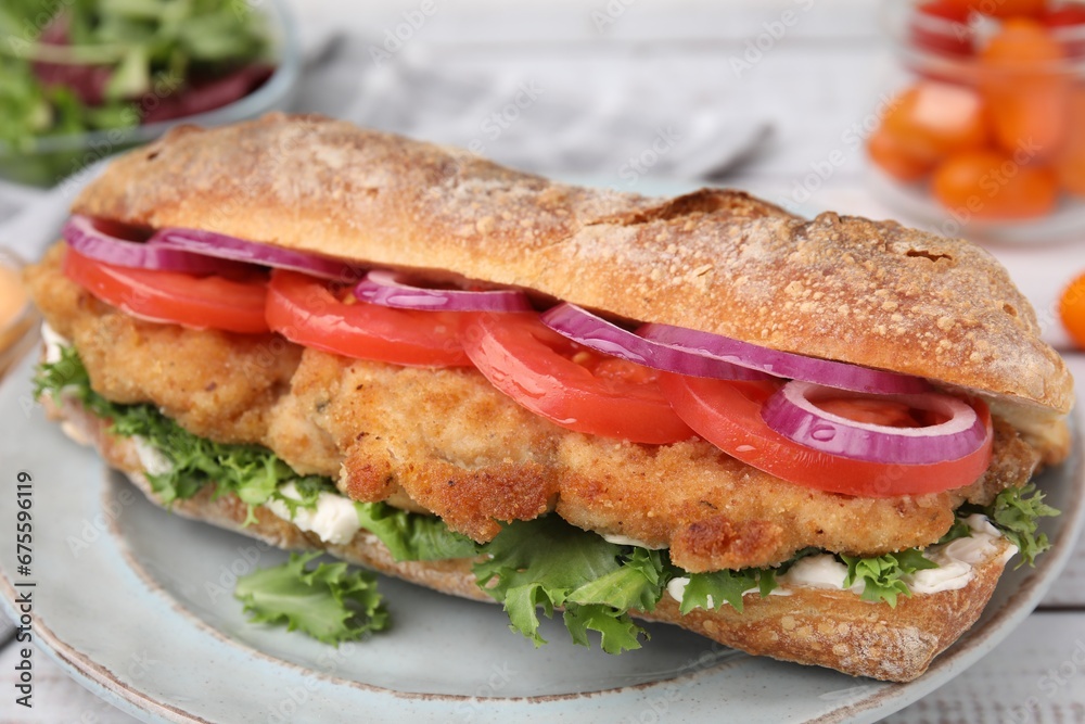 Delicious sandwich with schnitzel on white wooden table, closeup Delicious sandwich with schnitzel on white wooden table, closeup