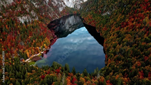 Aerial view of the Lake Toplitz, reflecting in middle of fall colored mountains photo