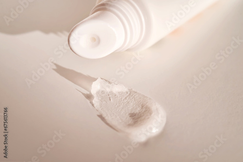 Hygienic moisturizing lip balm in a tube on a white background. photo