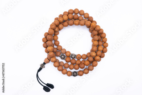 Japa Mala - Buddhist, Tibetan or Hindu wooden prayer beads isolated on white background