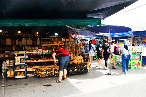 Chatuchak Weekend Market or Jatujak local walking street bazaar for thai people and foreign travelers travel visit and shopping goods products gifts souvenirs on October 29, 2023 in Bangkok, Thailand photo