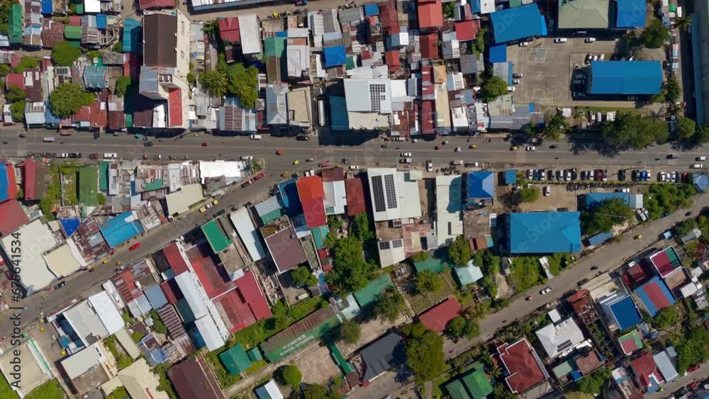 Overhead shot of the streets and buildings of Surigao City in the Philippines, aerial top down Overhead shot of the streets and buildings of Surigao City in the Philippines, aerial top down