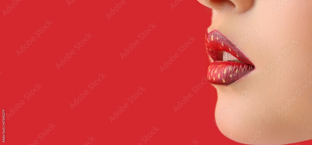 Beautiful young woman with unusual strawberry makeup on red background with space for text, closeup Beautiful young woman with unusual strawberry makeup on red background with space for text, closeup