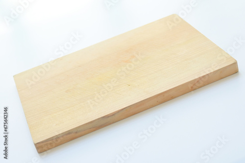wooden cutting board isolated on white background, plank wood in the kitchen