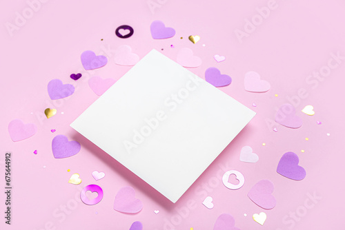 Blank card with hearts on pink background © Pixel-Shot