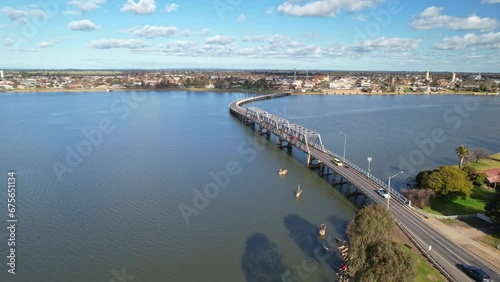 Wallpaper Mural Over trees and the road bridge towards the town of Yarrawonga, Victoria, Australia Torontodigital.ca