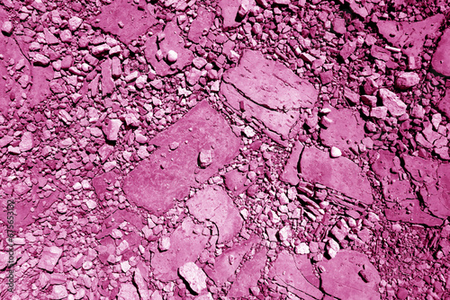 Gravel stones road in pink tone.