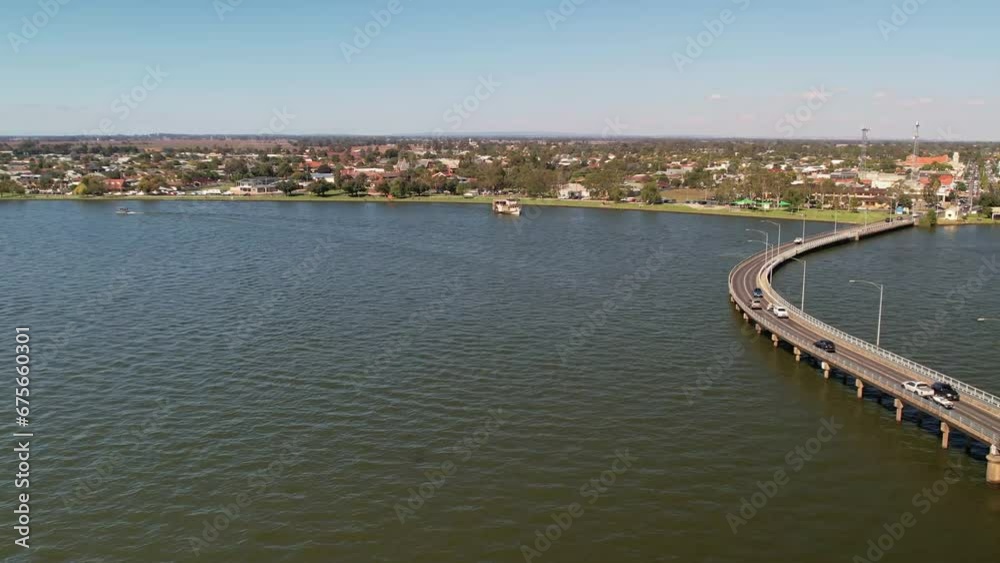 Over Lake Mulwala alongside the bridge and approaching the paddle steamer Cumberoona Over Lake Mulwala alongside the bridge and approaching the paddle steamer Cumberoona