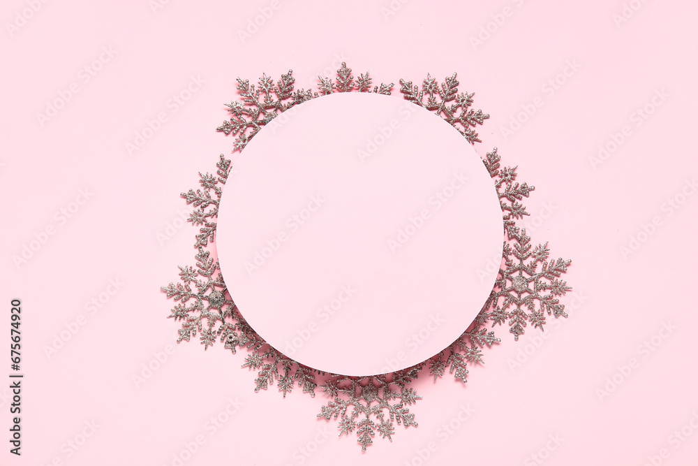 Blank card with beautiful snowflakes on pink background