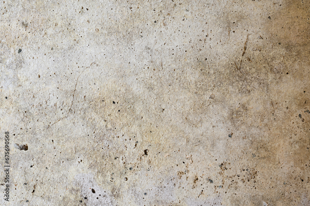 An old wall with a cracked texture is decorated with cement mortar An old wall with a cracked texture is decorated with cement mortar