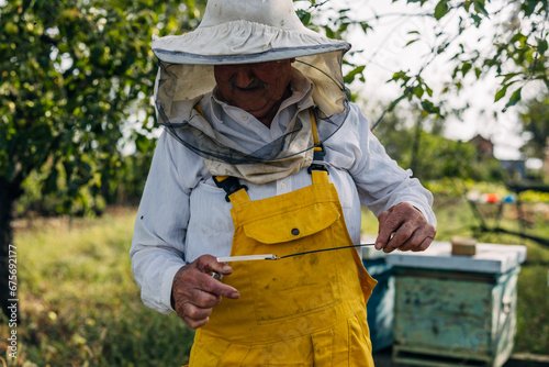 Apiarist doing a sample check.