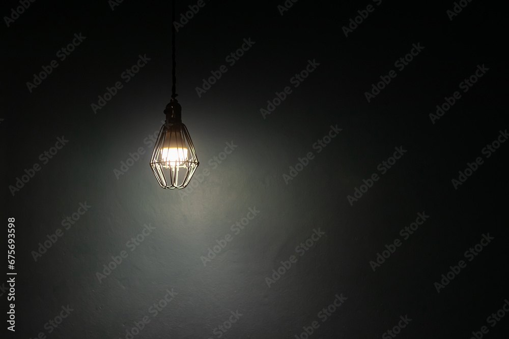 Light bulb warm light shade on dark background, concept of creativity and innovation. Light bulb warm light shade on dark background, concept of creativity and innovation.
