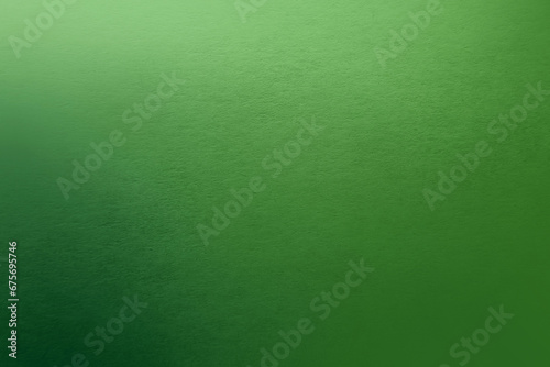 Dark solid green tone color gradation pale light emerald green paint on environmental friendly cardboard box blank paper texture background with space minimal style photo