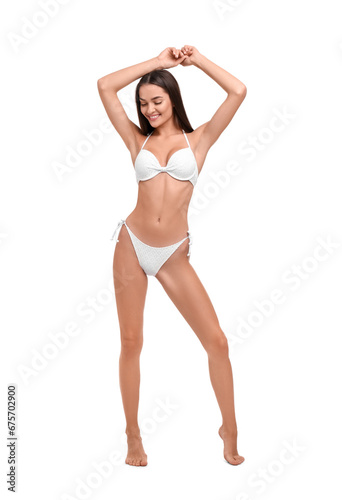 Young woman in stylish bikini isolated on white