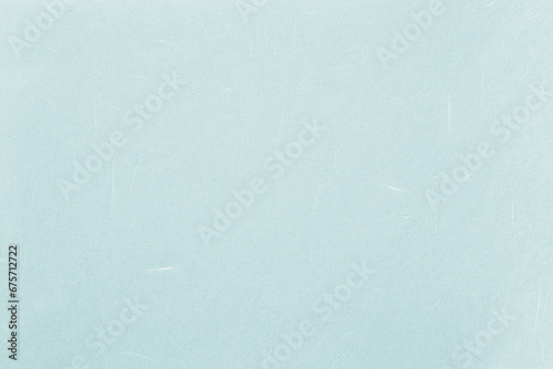 Light blue Japanese paper background with fibers photo