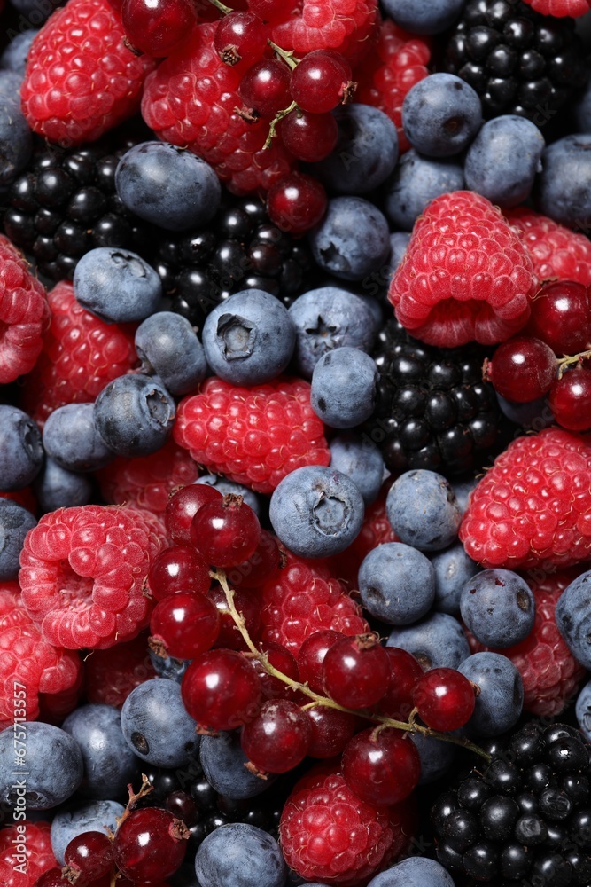 Assortment of fresh ripe berries as background, top view Assortment of fresh ripe berries as background, top view