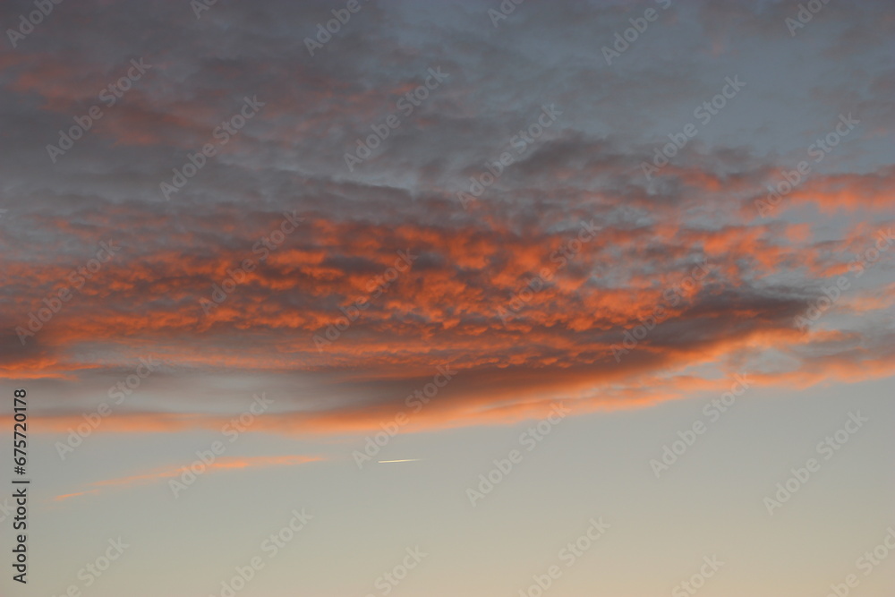 Fototapeta premium Nuages roses au coucher du soleil