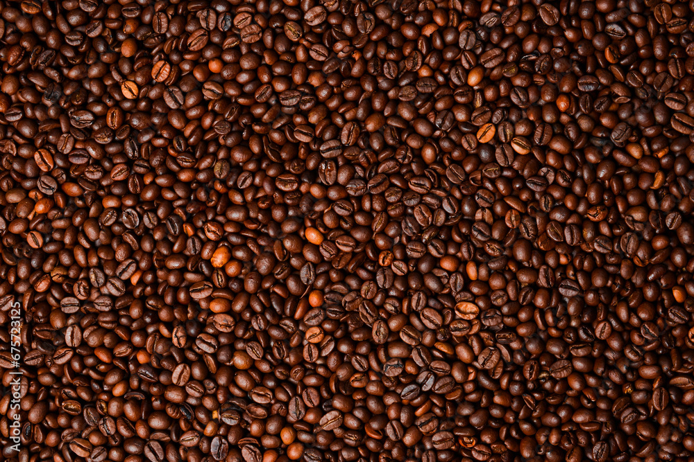 roasted coffee bean background, top view. Macro photo. Free space for text. roasted coffee bean background, top view. Macro photo. Free space for text.