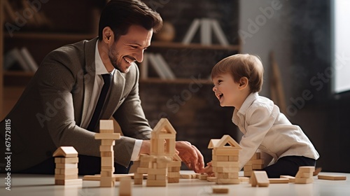 businessman in suit and little son playing with wooden blocks on floor at home, work and life balance concept photo