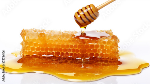 Honeycomb with honey drop isolated on white background