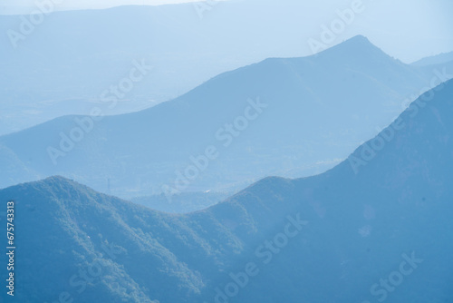 Fototapeta Naklejka Na Ścianę i Meble -  Mountains and forests under the sky