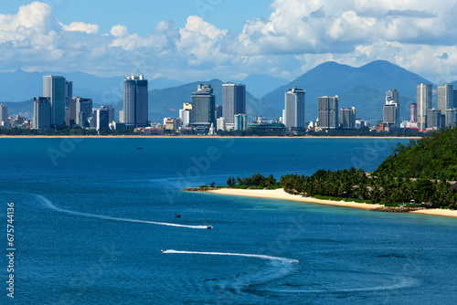 The sea bay and the Vietnamese city of Nha Trang on a sunny cloudy day