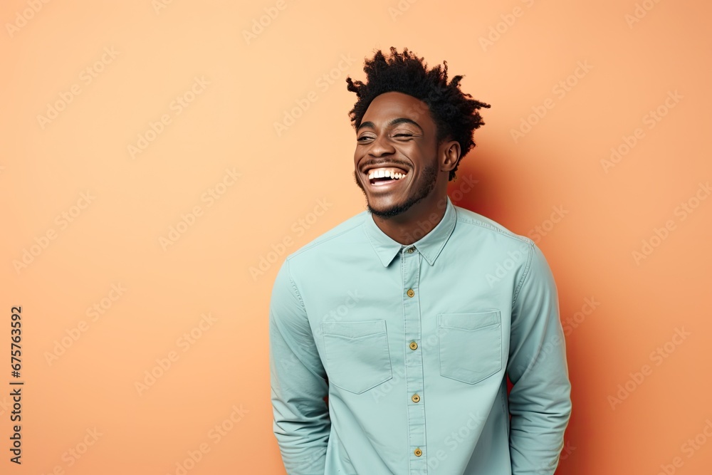 happy african american man laughing and looking away on orange background. Banner copy space. Ai generative happy african american man laughing and looking away on orange background. Banner copy space. Ai generative
