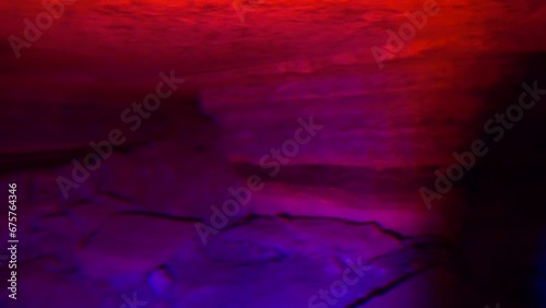 In the cave. Flashing light - danger photo